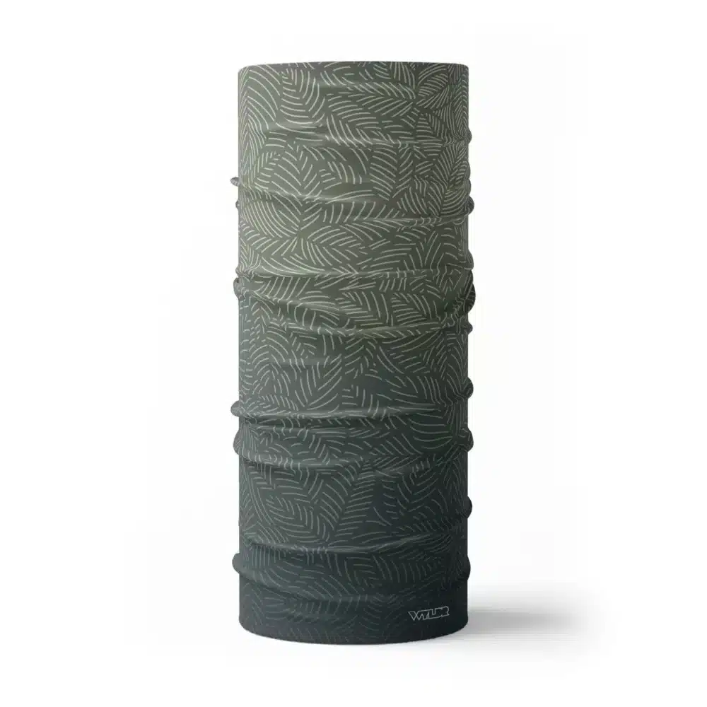 image of a tubular neck gaiter with a crisp leaf pattern overlaid on a gradient background. The colors used in the gradiant are slate, sunflower and sage.