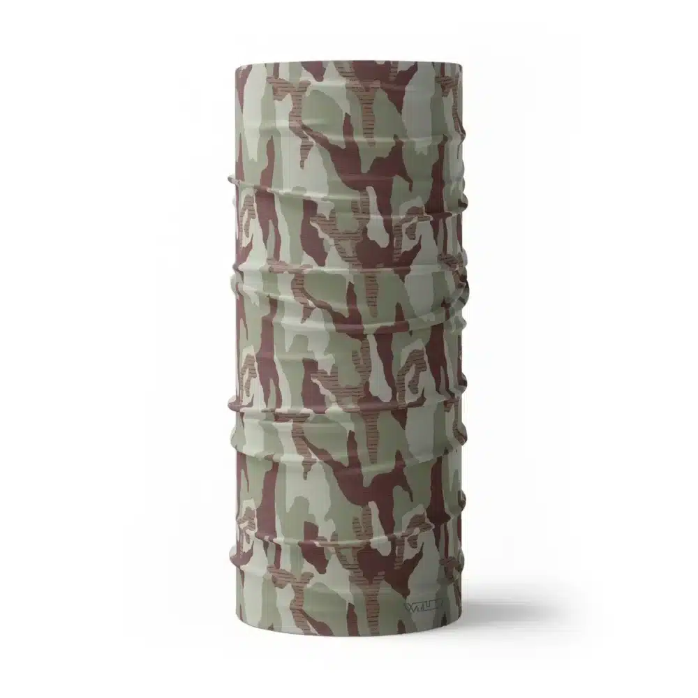 an image of full size neck gaiter in a camo pattern. inspired by current military camo, this takes that design and adds lined texture to some of the colors. featuring cedar and dune color variants