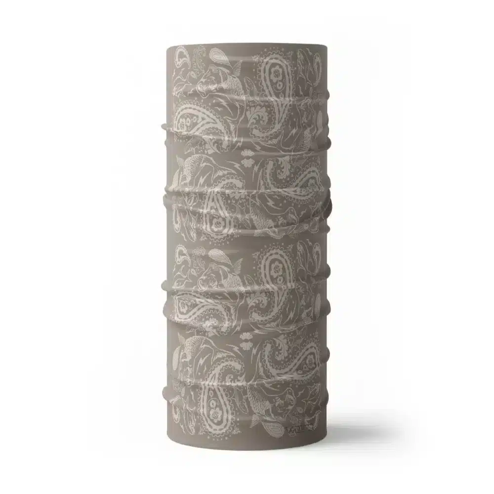 an image of a full neck gaiter where traditional paisley elements have been replaced with different fish species. this design is available in a putty/dune color variant
