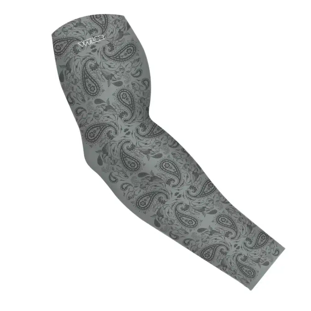 an image of an arm sleeve where paisley has been redesigned. traditional paisley elements have been replaced with different fish species. this design is available in a smoke/coal color variant
