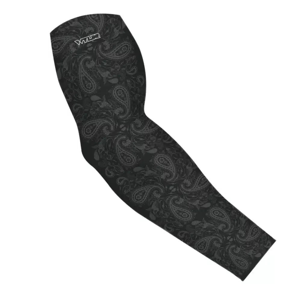 an image of an arm sleeve where paisley has been redesigned. traditional paisley elements have been replaced with different fish species. this design is available in a coal/smoke color variant