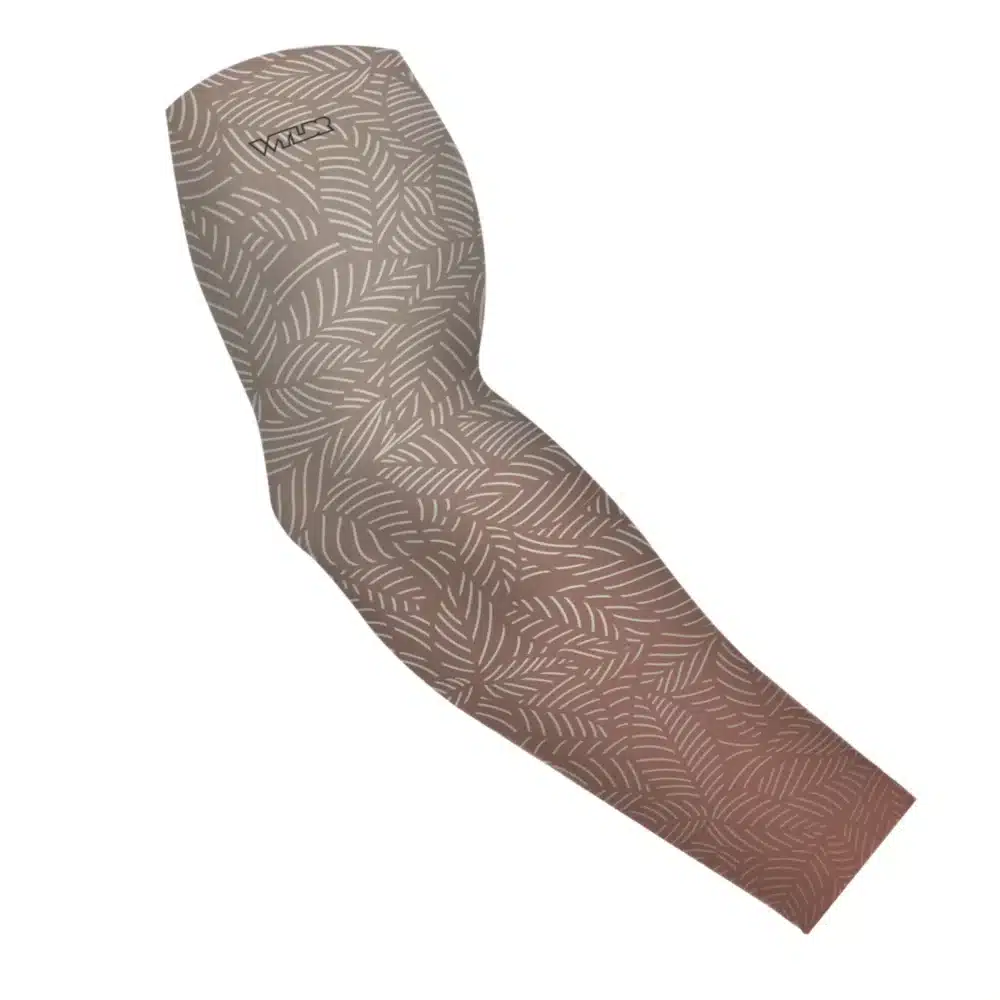 an image of an arm sleeve in an abstract pattern. lines are used to create the illusion of leaves on a gradient color background. this is in the dune/putty color variant
