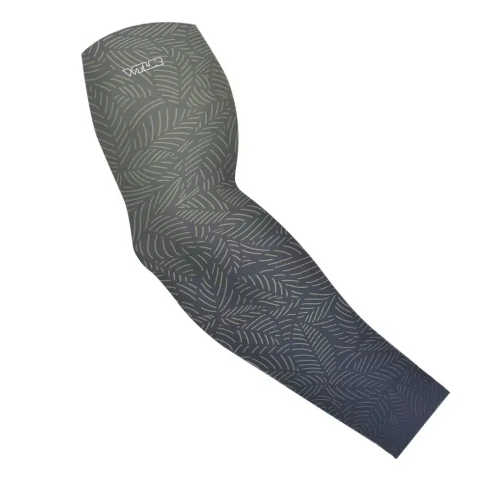 an image of an arm sleeve in an abstract pattern. lines are used to create the illusion of leaves on a gradient color background. this is in the rain/slate color variant