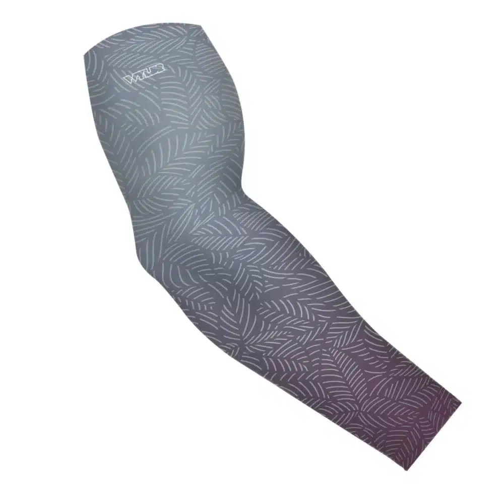 an image of an arm sleeve in an abstract pattern. lines are used to create the illusion of leaves on a gradient color background. this is in the vine/lake color variant