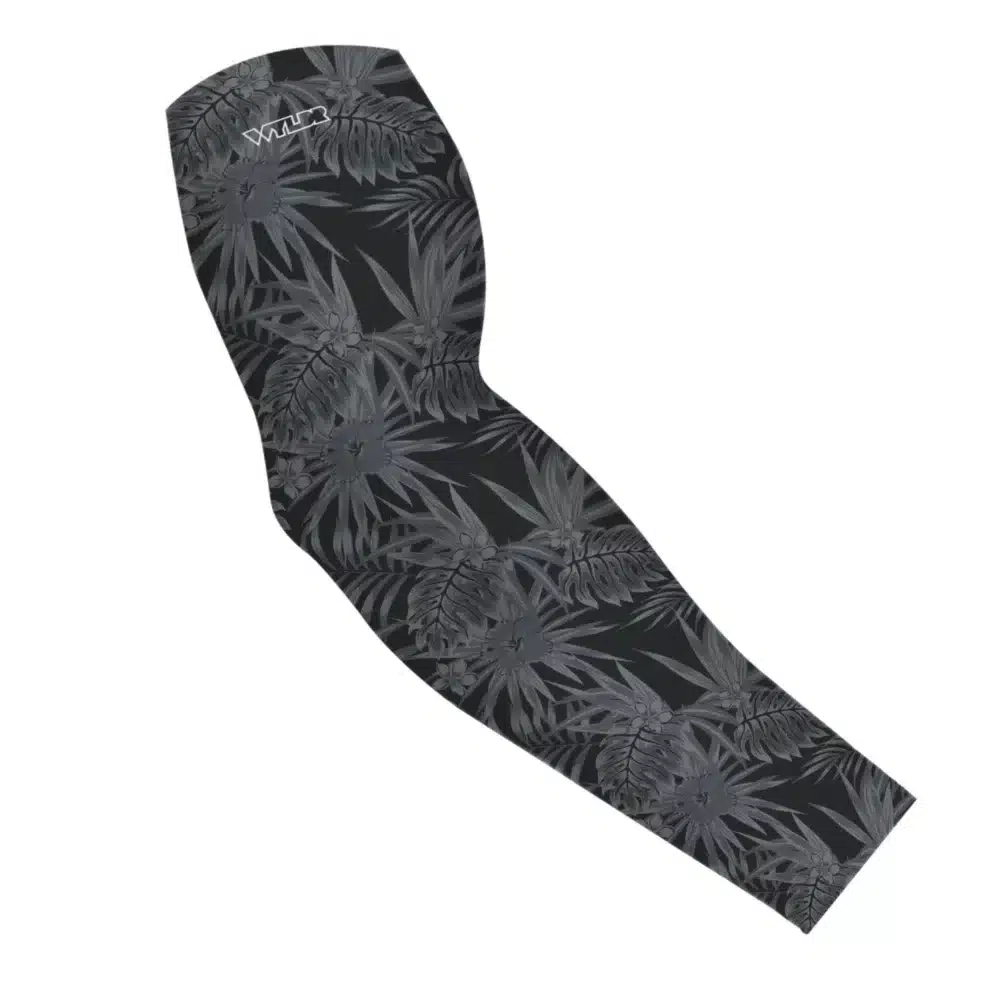 an image of an arm sleeve in an abstract pattern. lines are used to create the illusion of tropical flowers and leaves on a solid color background. this is in the coal/smoke color variant