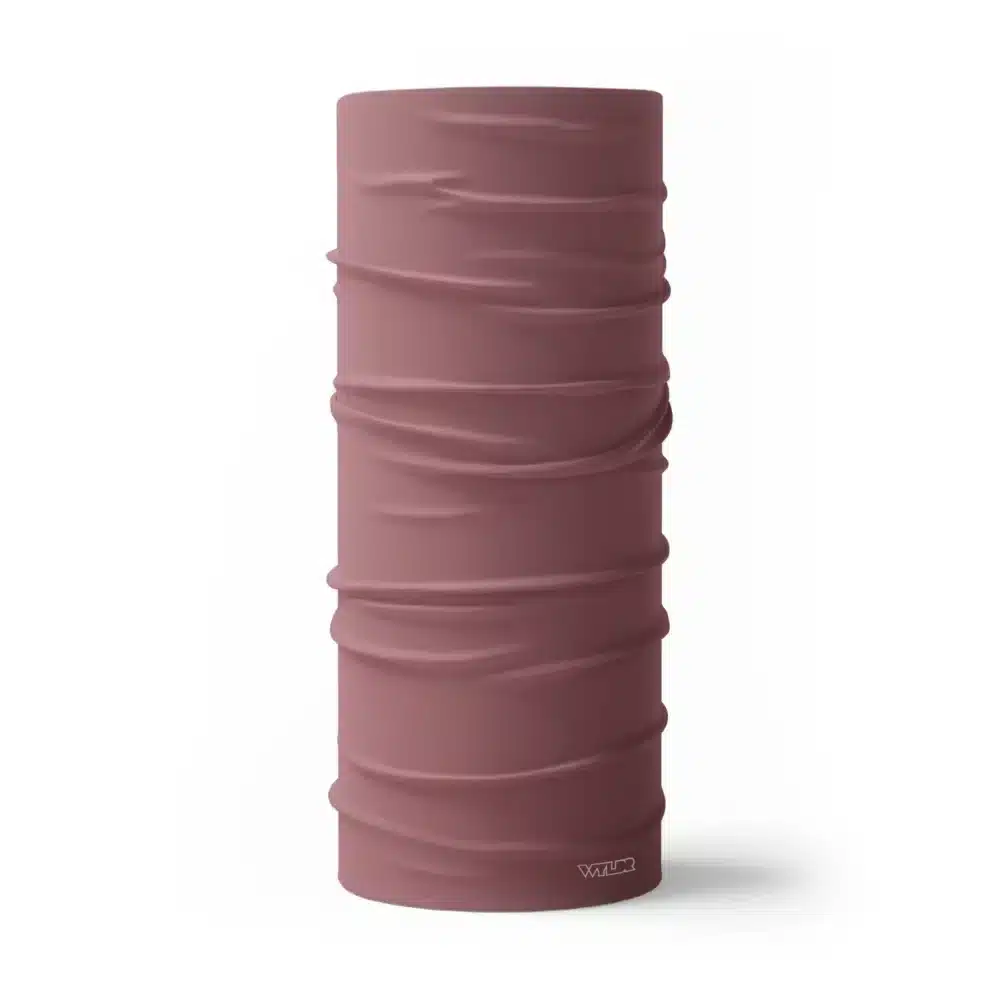 image of a tubular neck gaiter in a solid color called hibiscus, or a mauve / pink.