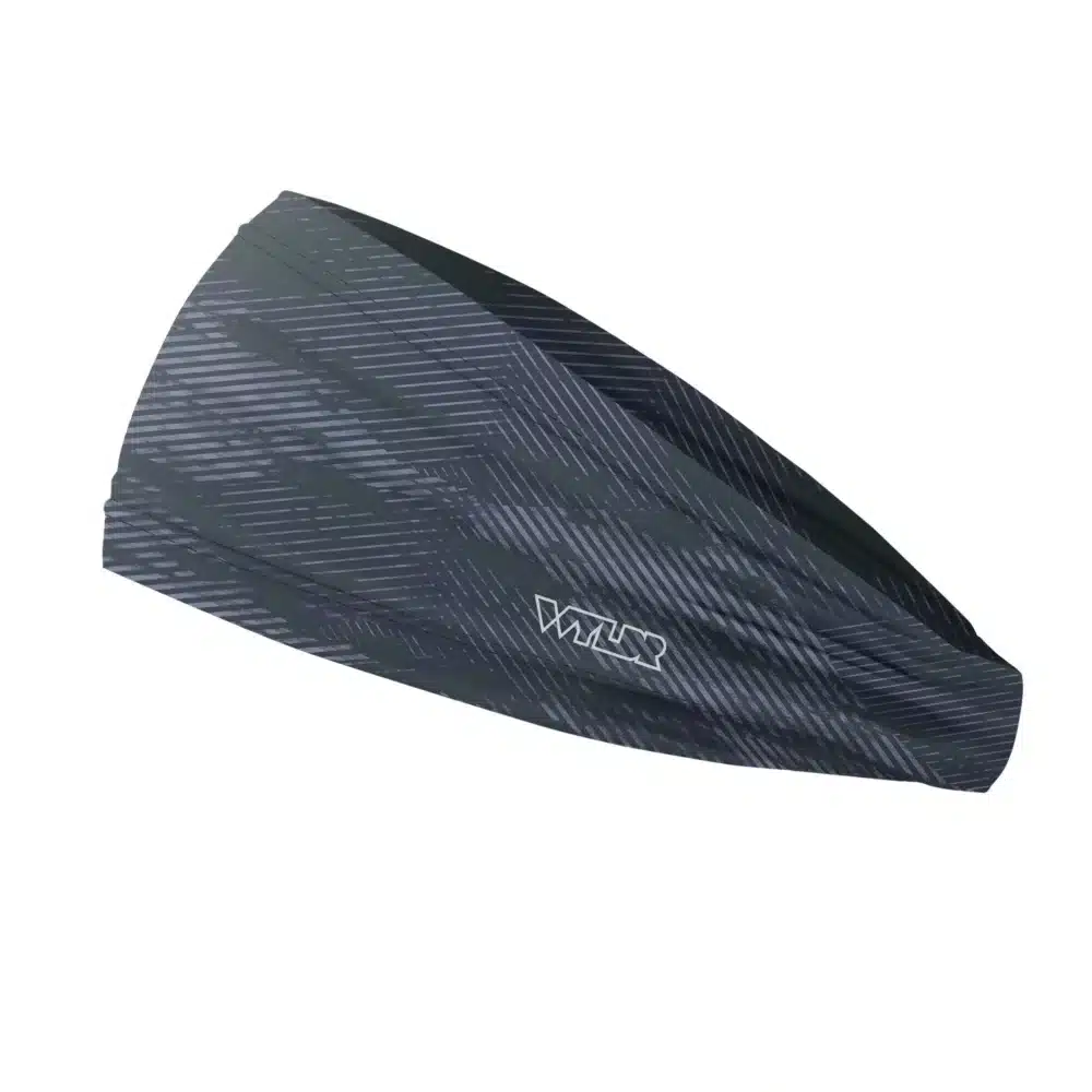 Side view of a headband that is 3 inches at the front and 1 inch in the back to show that it is tapered. the design is an abstract pattern. lines are used to create the illusion of mountain ridges. this is in the coal/smoke color variant