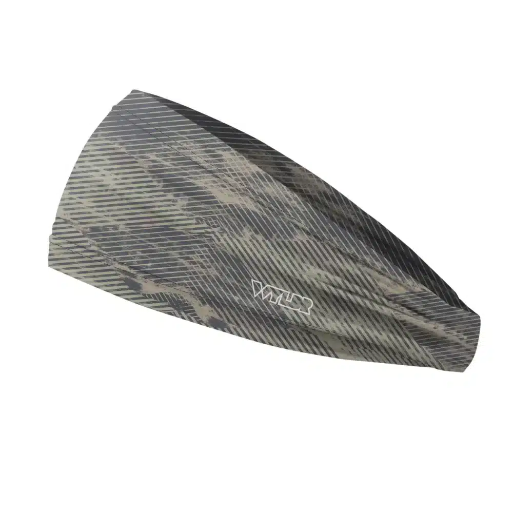 Side view of a headband that is 3 inches at the front and 1 inch in the back to show that it is tapered. the design is an abstract pattern. lines are used to create the illusion of mountain ridges. this is in the sage/dune color variant