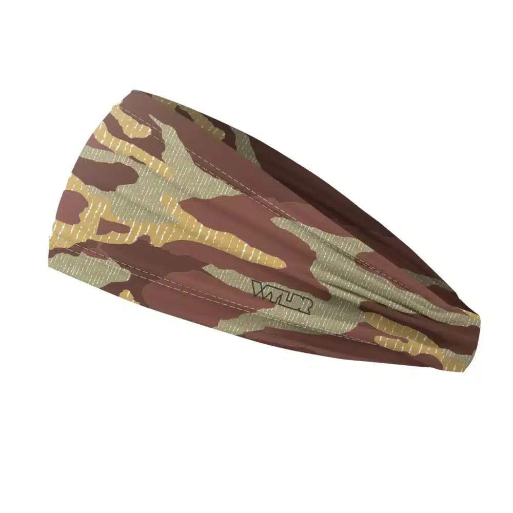 Side view of a headband that is 3 inches at the front and 1 inch in the back to show that it is tapered. inspired by current military camo, this takes that design and adds lined texture to some of the colors. featuring coal and smoke color variants