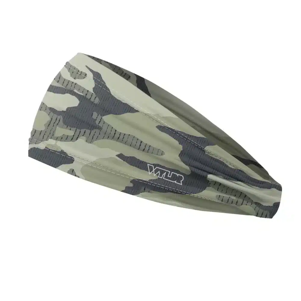 Side view of a headband that is 3 inches at the front and 1 inch in the back to show that it is tapered. inspired by current military camo, this takes that design and adds lined texture to some of the colors. featuring sage and rain color variants