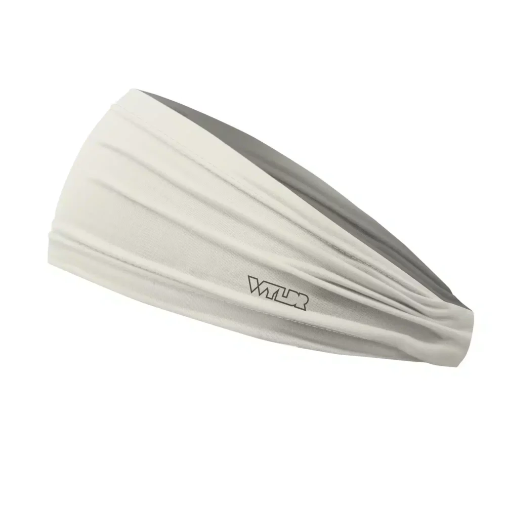 A side view of the Dune-colored (off-white) tapered sports headband.