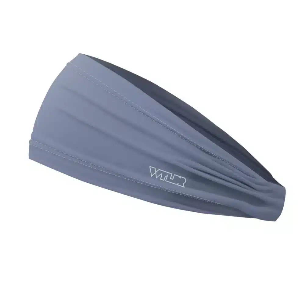 Side view of a headband that is 3 inches at the front and 1 inch in the back to show that it is tapered. this is a solid color in a blue shade called lake