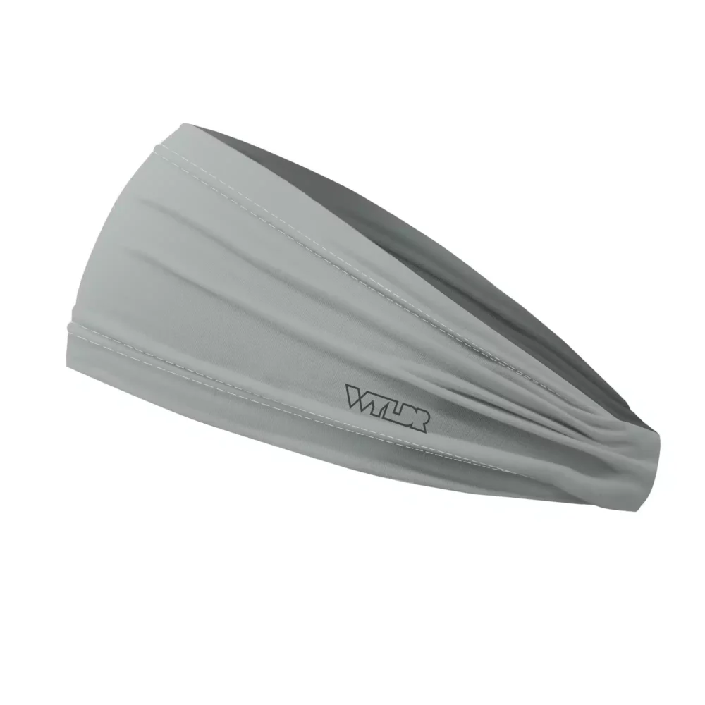 Side view of a headband that is 3 inches at the front and 1 inch in the back to show that it is tapered. this is a solid color in a green shade called sage