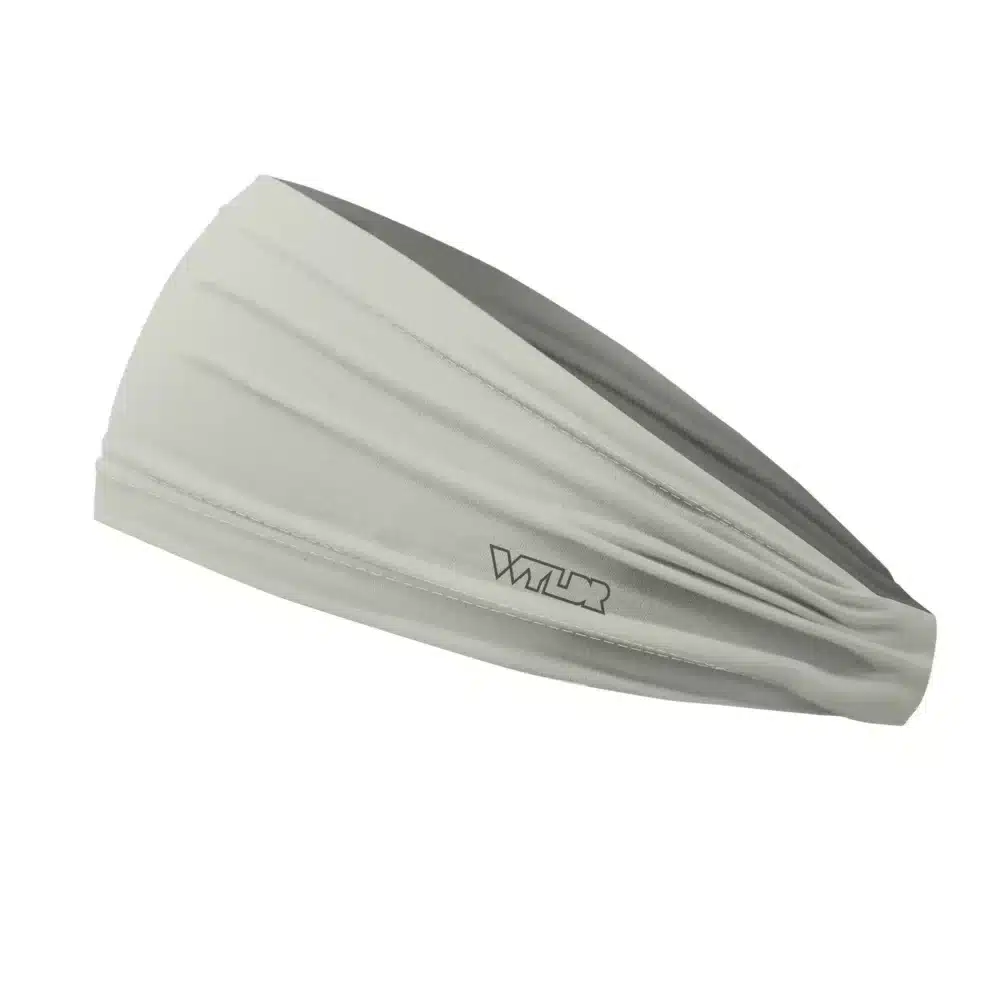 Side view of a headband that is 3 inches at the front and 1 inch in the back to show that it is tapered. this is a solid color in eggshell white