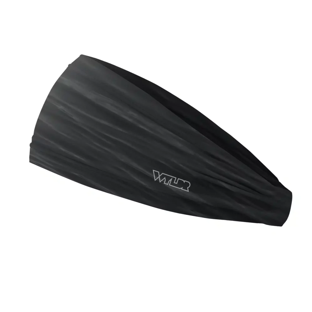 Side view of a headband that is 3 inches at the front and 1 inch in the back to show that it is tapered. The design is a ripple pattern featuring black and gray colors.