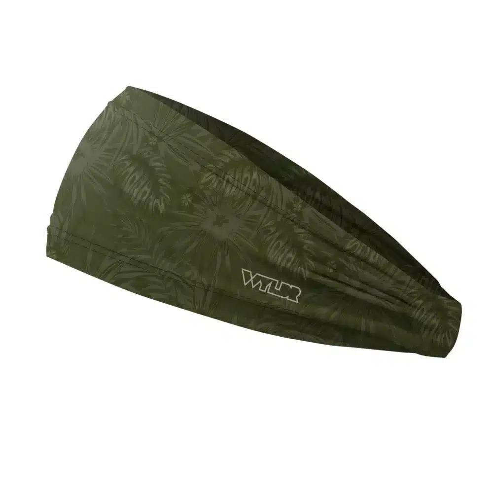 Side view of a headband that is 3 inches at the front and 1 inch in the back to show that it is tapered. The design is an abstract pattern. lines are used to create the illusion of tropical flowers and leaves on a solid color background. this is in the celery/smoke color variant
