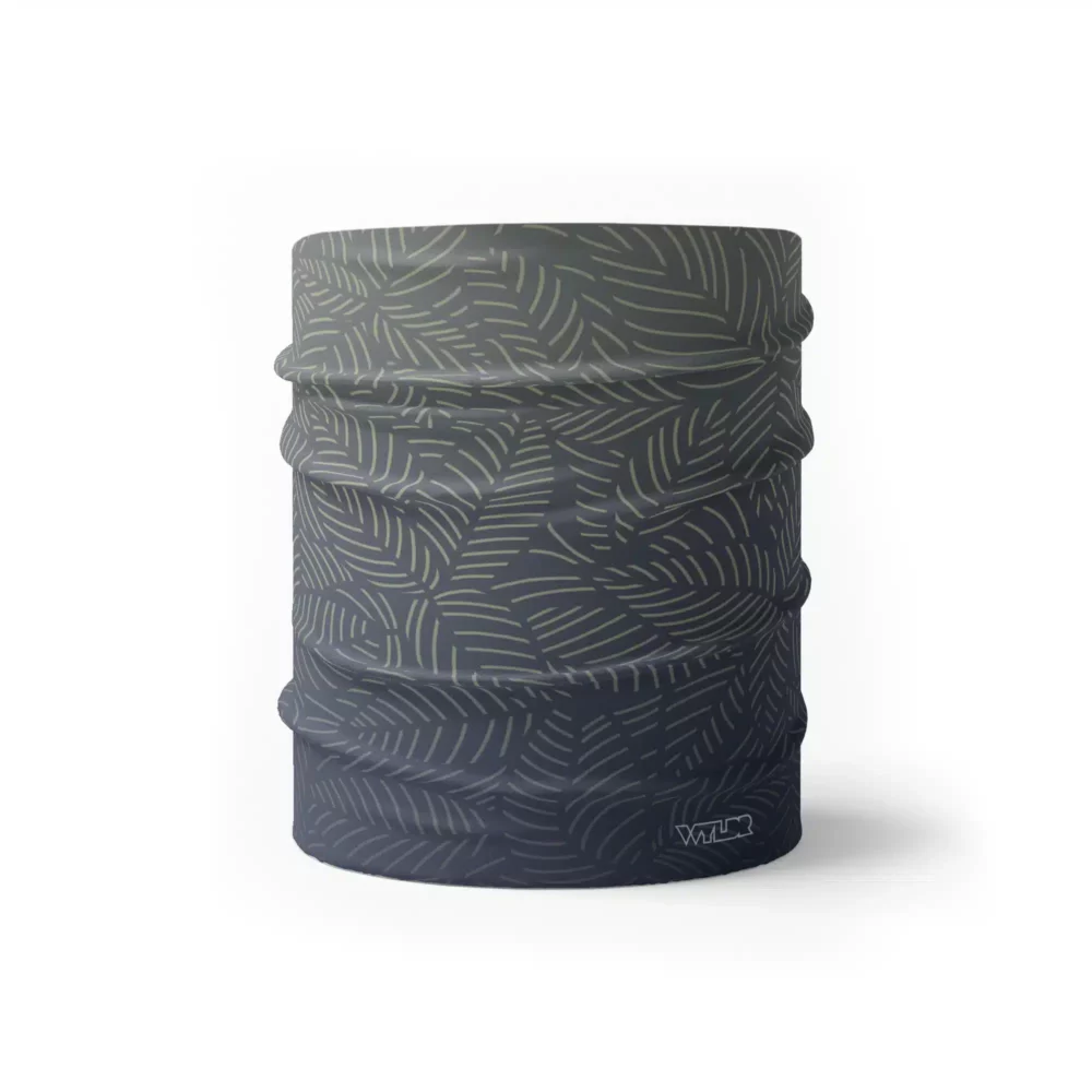 image of a wide sports headband with a crisp leaf pattern overlaid on a gradient background. The colors used in the gradiant are rain, slate and dune.