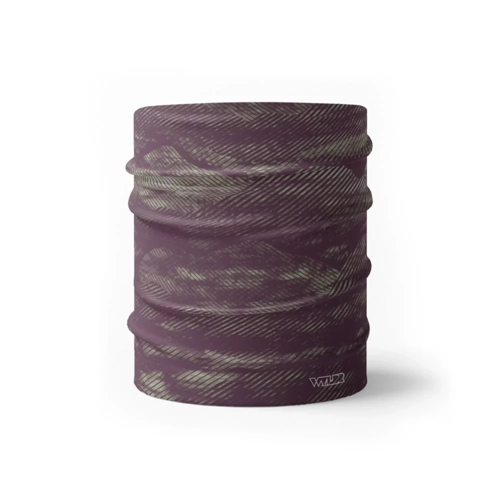 an image of a half neck gaiter in an abstract pattern. lines are used to create the illusion of mountain ridges. this is in the vine/celery color variant