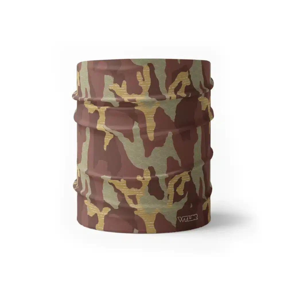 an image of half size neck gaiter in a camo pattern. inspired by current military camo, this takes that design and adds lined texture to some of the colors. featuring cedar and celery color variants