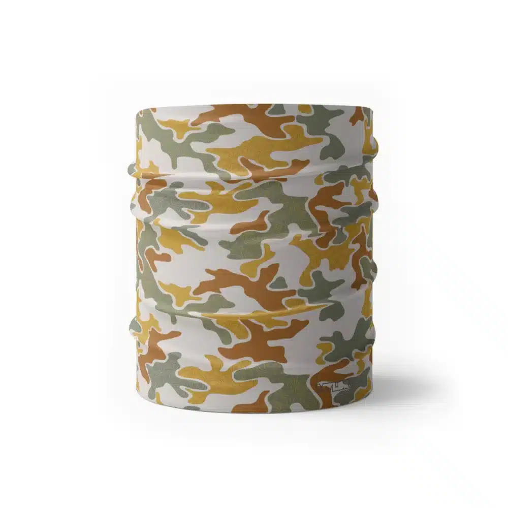 image of a wide sports headband in an updated version of the US Woodland style camo. A topo design has been overlaid on some colors providing an intricate detail to the pattern. The colors used in this design are sunflower, celery, cedar and dune.