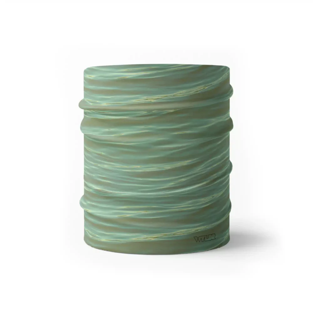 a half size neck gaiter in a ripple pattern featuring green and orange colors
