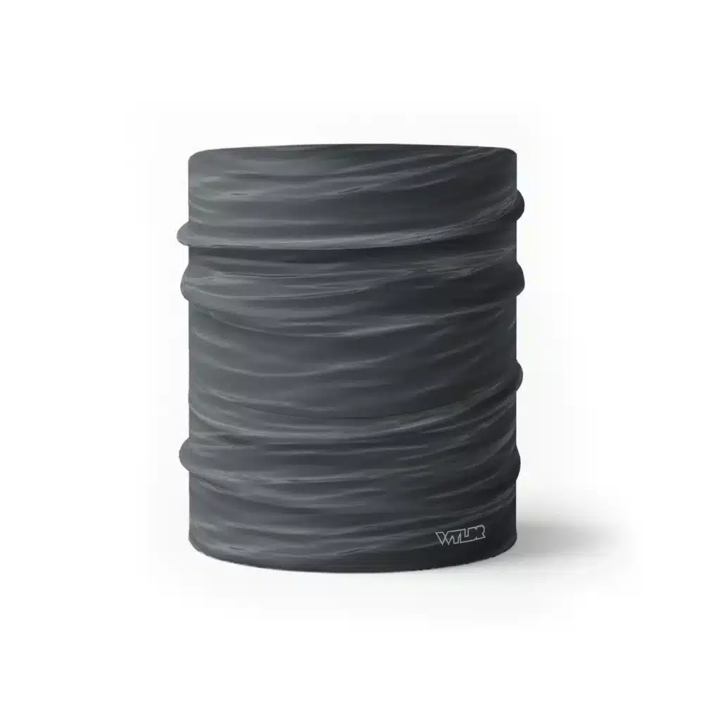 a half size neck gaiter in a ripple pattern featuring gray colors