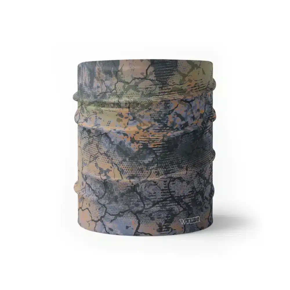 an image of a half sized neck gaiter. an abstract design in greens, corals and purples created to mimic the colorful designs found on fish