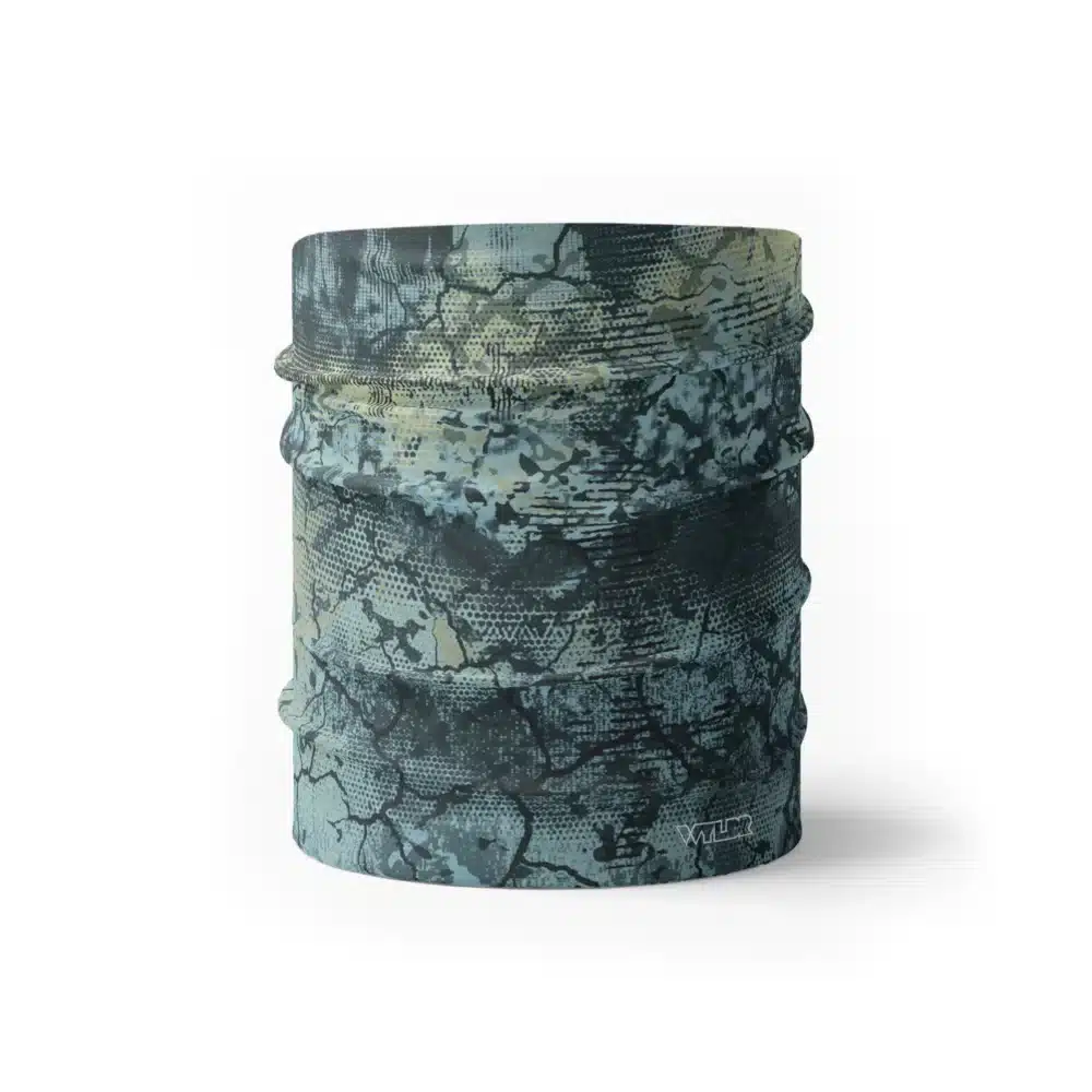 an image of a half sized neck gaiter. an abstract design in light greens and blues created to mimic the colorful designs found on fish
