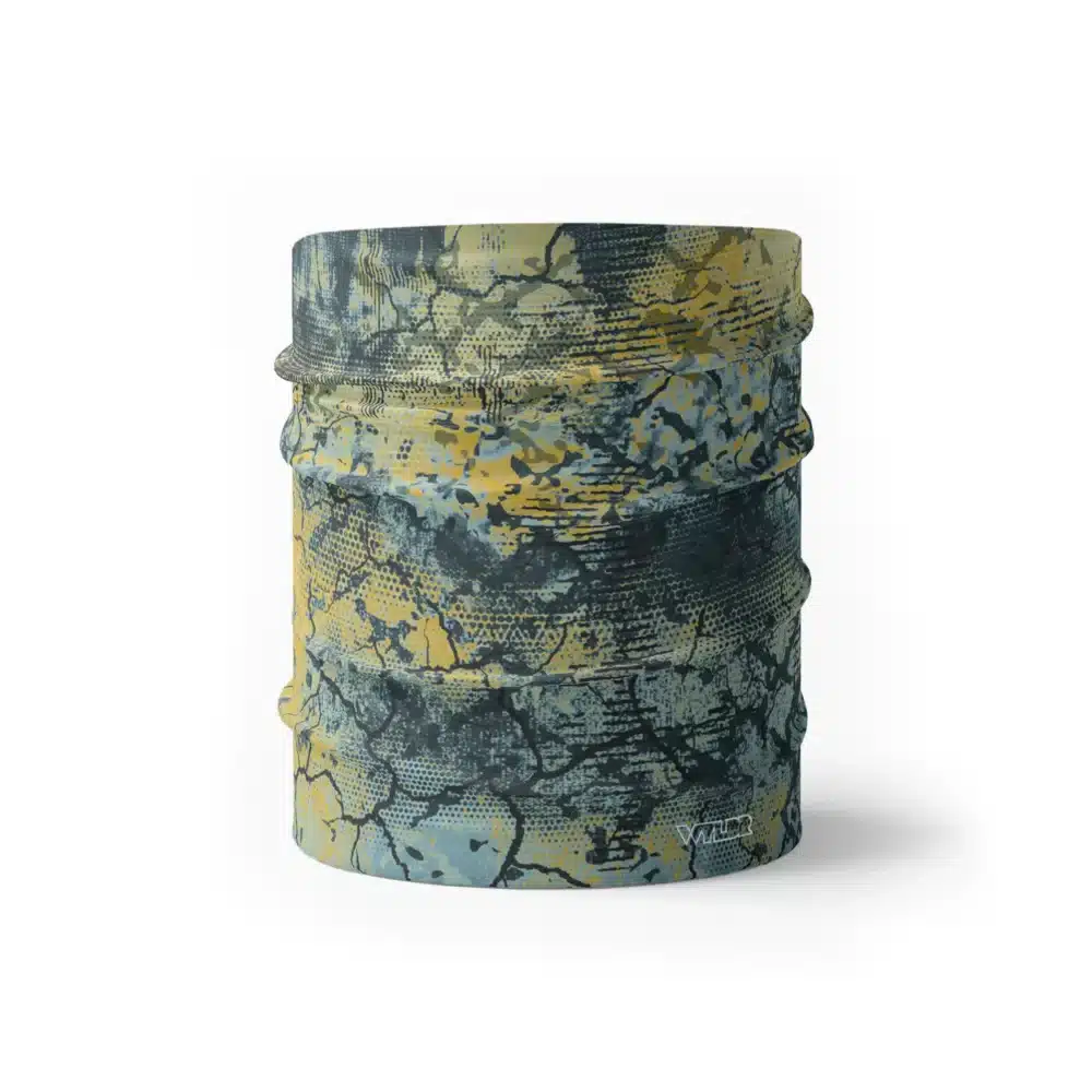 an image of a half sized neck gaiter. an abstract design in yellows and blues created to mimic the colorful designs found on fish