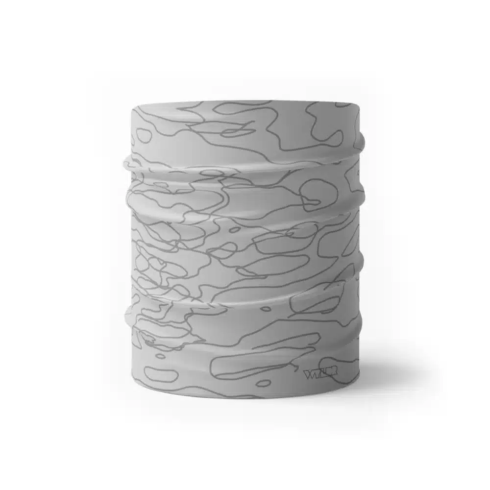 a half size neck gaiter in a simple re-designed topographical map design. Background is an off-white background with dark gray lines.