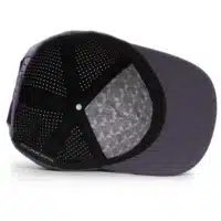 (RH) Ridge Hat | Amethyst - Interior View interior view of a water resistant, floatable hat in dark purple. the lining has the name brand, Wyldr, and there is a two panel fabric lining in a patterned "w" logo