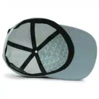 (RH) Ridge Hat | Mist - Interior View interior view of a water resistant, floatable hat in light blue. the lining has the name brand, Wyldr, and there is a two panel fabric lining in a patterned "w" logo