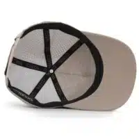 (RH) Ridge Hat | Putty - Interior View interior view of a water resistant, floatable hat in warm tan. the lining has the name brand, Wyldr, and there is a two panel fabric lining in a patterned "w" logo
