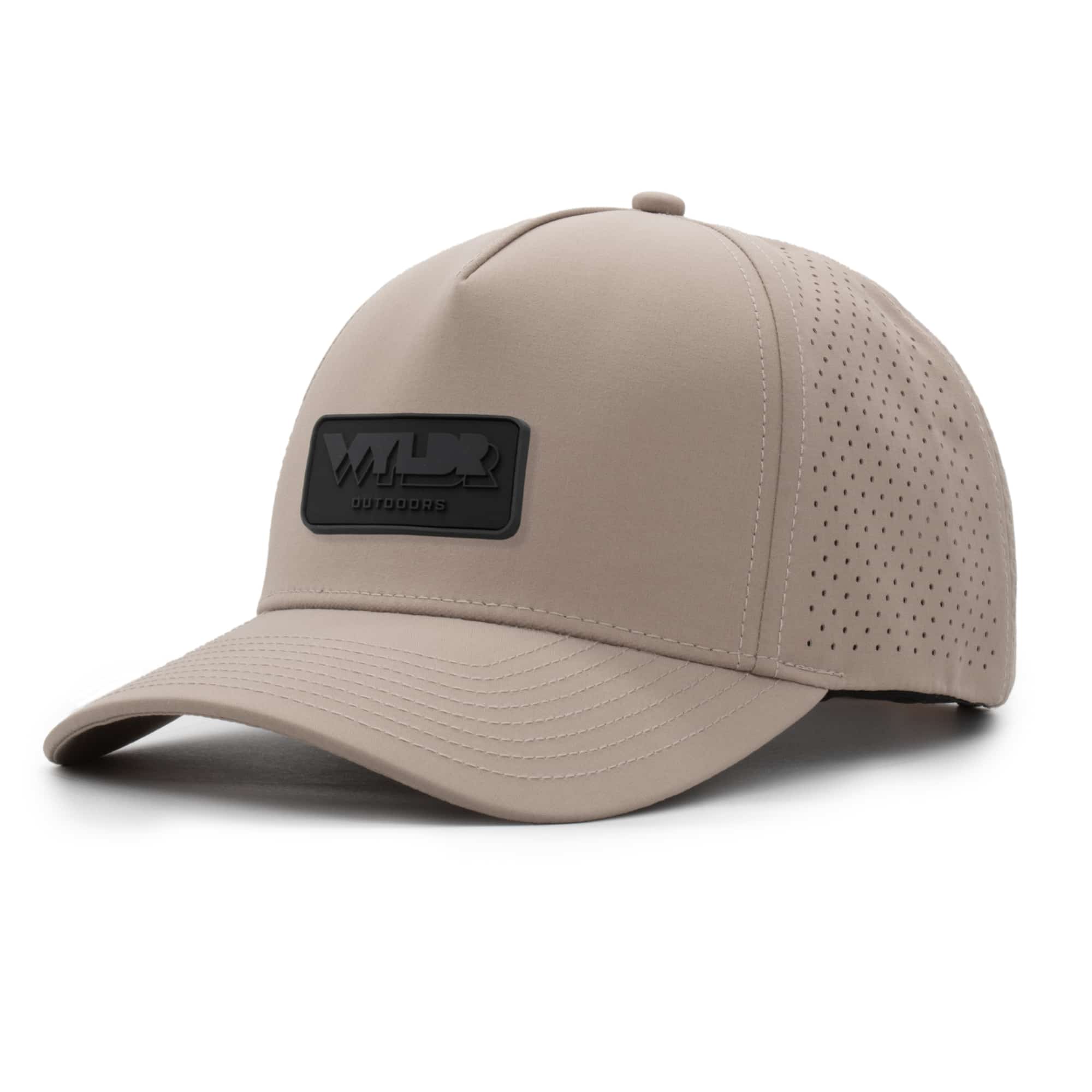 (RH) Ridge Hat | Putty - Rectangle three-quarter view of a 5 panel, water resistant, floatable hat with a PVC patch. the patch is the brand name Wyldr contained in a rounded rectangle. the hat is a warm tan color