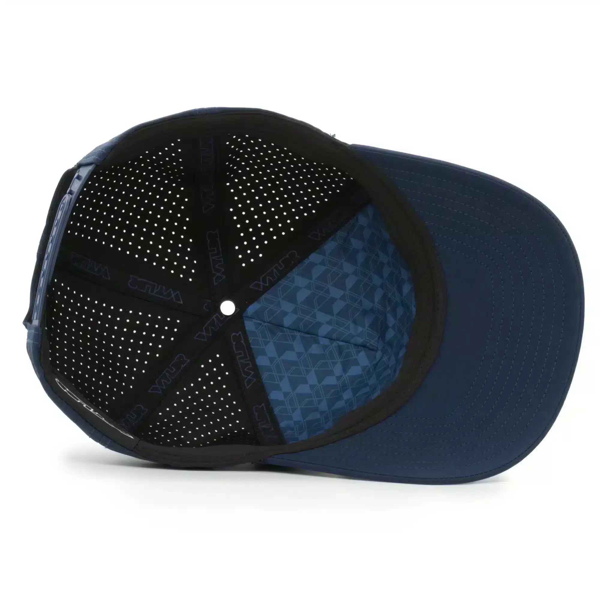 (RH) Ridge Hat | Rain - Interior View interior view of a water resistant, floatable hat in dark blue. the lining has the name brand, Wyldr, and there is a two panel fabric lining in a patterned "w" logo