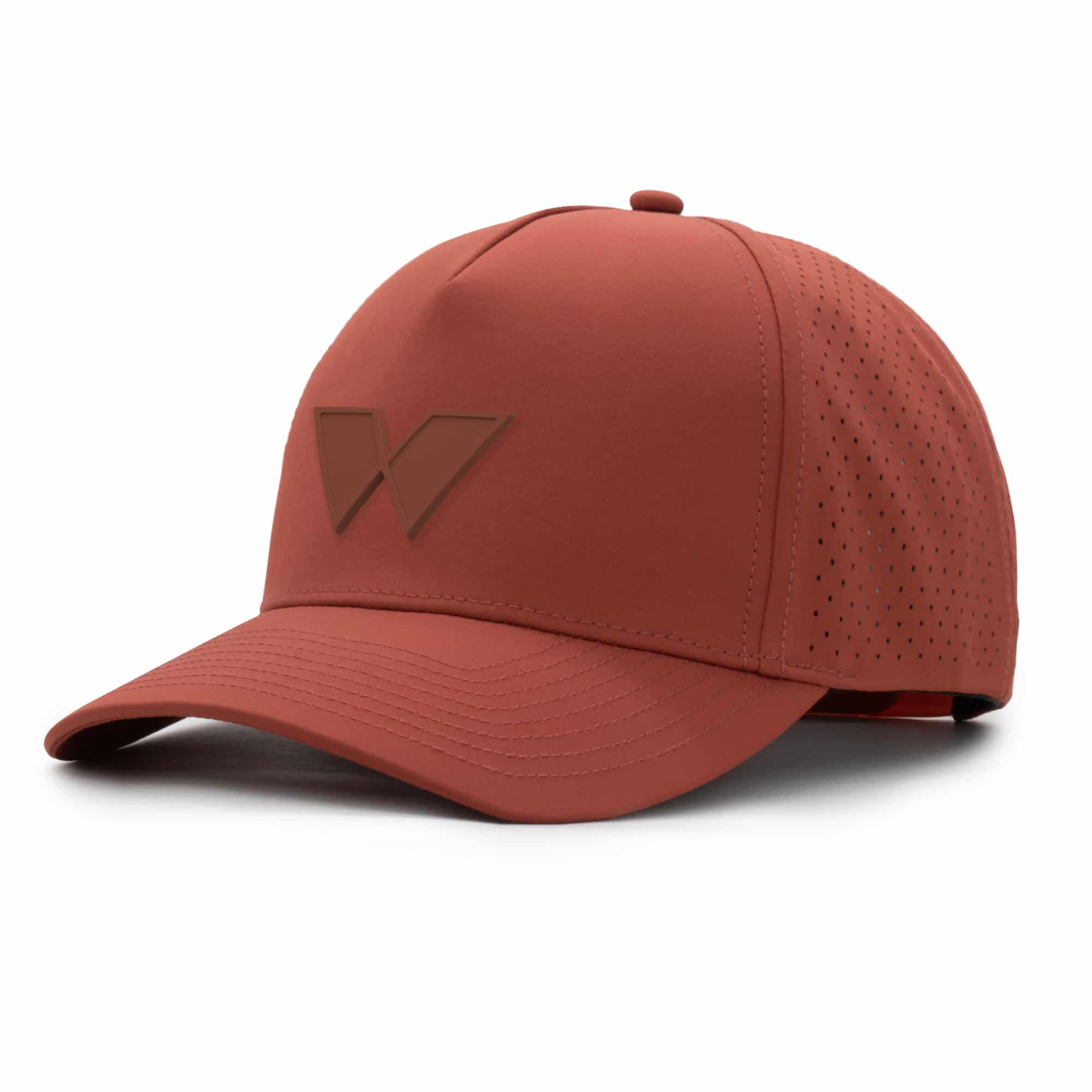 three-quarter view of a 5 panel, water resistant, floatable hat with a PVC patch. the patch is of the letter W from the brand name Wyldr. the hat is a rusty-orange color. the patch matches the hat color.