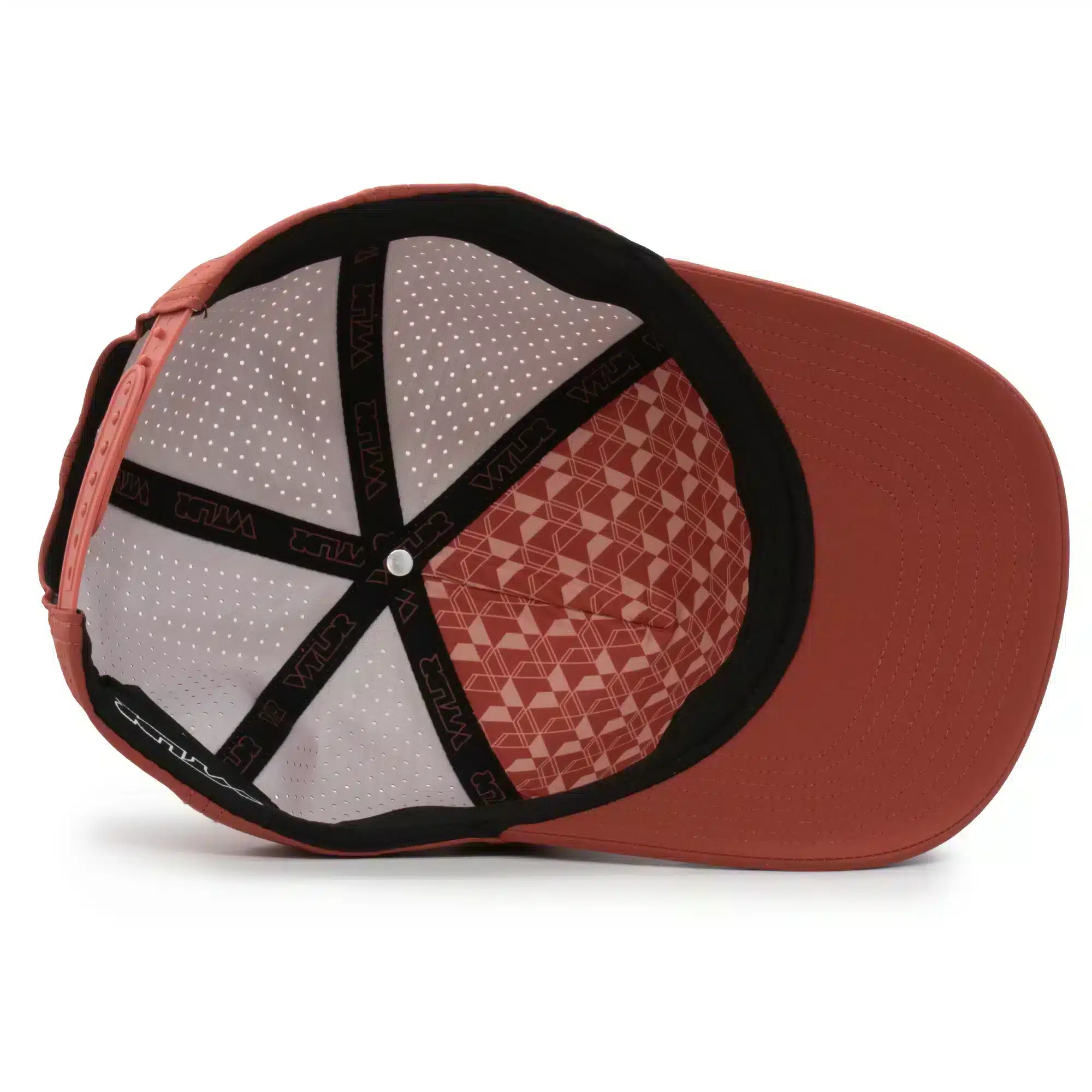 (RH) Ridge Hat | Rust - Interior View interior view of a water resistant, floatable hat in rust / orange. the lining has the name brand, Wyldr, and there is a two panel fabric lining in a patterned "w" logo