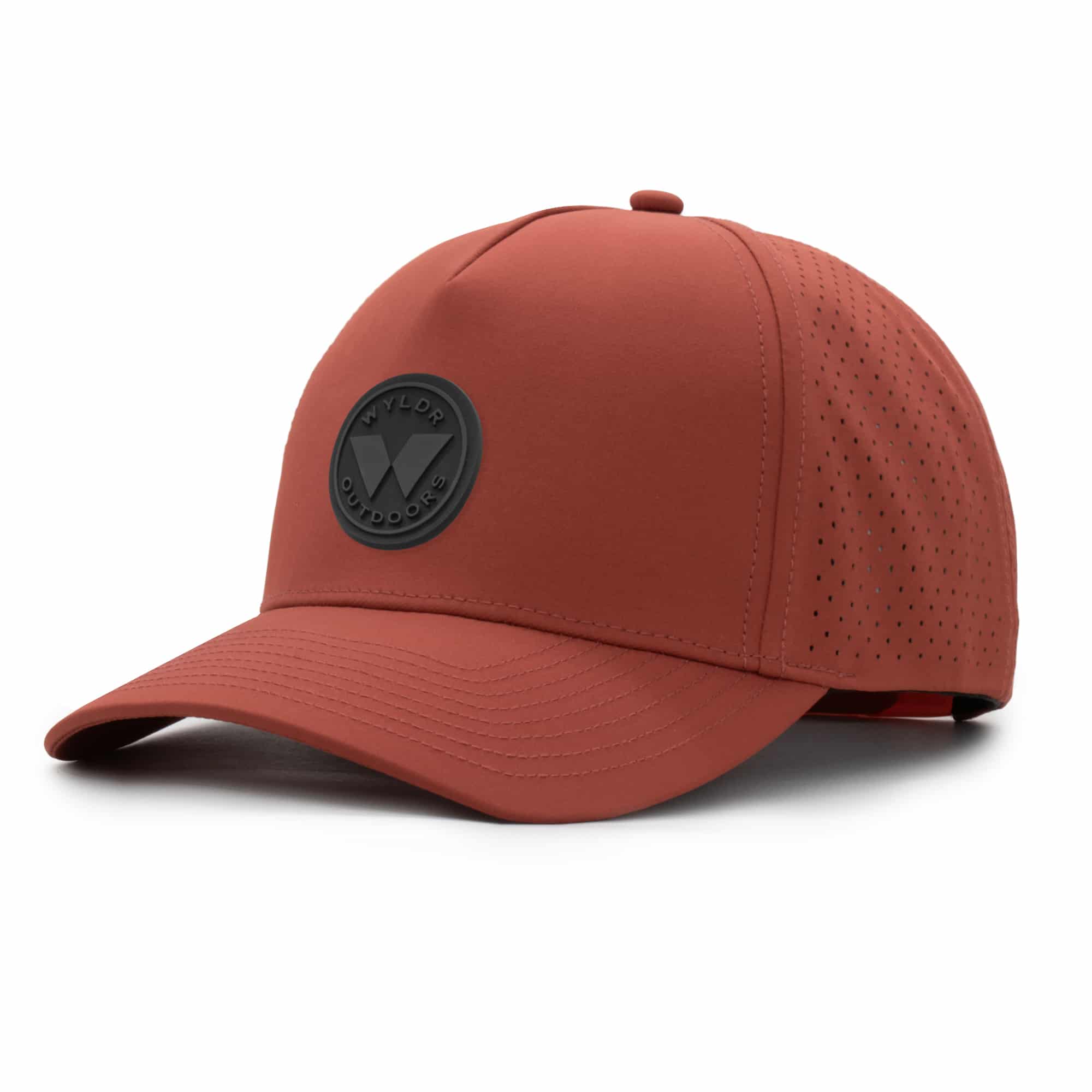 three-quarter view of a 5 panel, water resistant, floatable hat with a PVC patch. the patch is a round medallion featuring the letter W and the text Wyldr Outdoors. the hat is a rusty-orange color