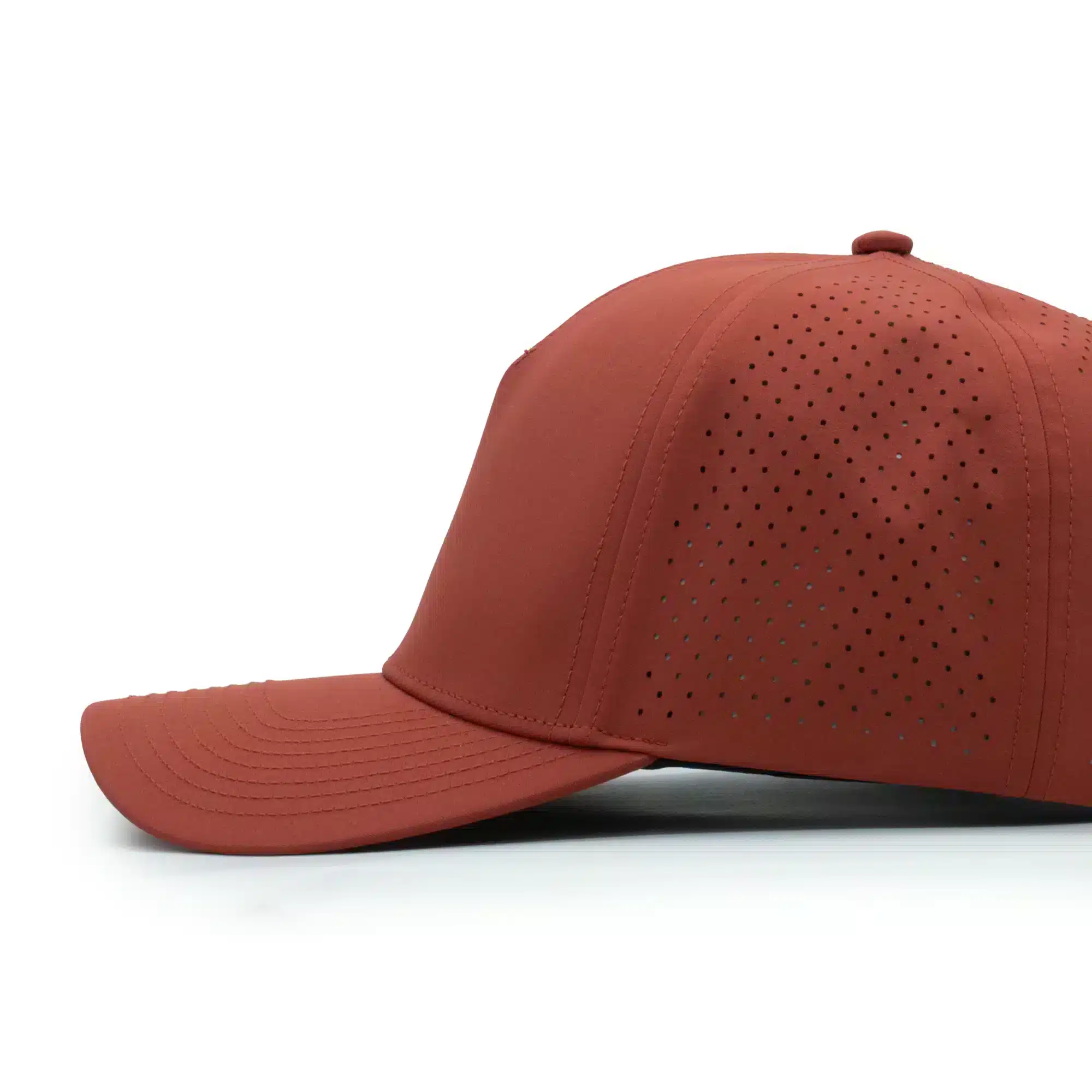 (RH) Ridge Hat | Rust - Side View side view of a 5 panel, water resistant, floatable hat. the hat is orange in color