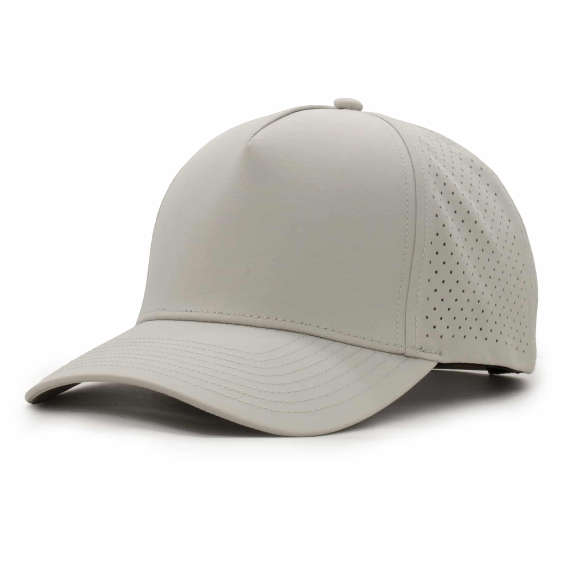 (RH) Ridge Hat | Stone - No Patch three-quarter view of a 5 panel, water resistant, floatable hat that is light tan in color.