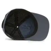 interior view of a water resistant, floatable hat in dark gray-blue color. the lining has the name brand, Wyldr, and there is a two panel fabric lining in a patterned "w" logo