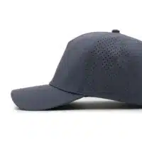 side view of a 5 panel, water resistant, floatable hat. the hat is dark blue-gray in color